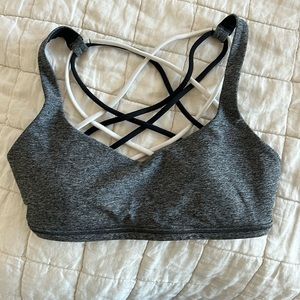 Lulu lemon sports bra. Grey with black and white straps on the back.